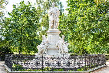 Fototapeta na wymiar Statue Of Johann Wolfgang Von Goethe, a German writer and statesman, in Tiergarten park, Berlin, Germany