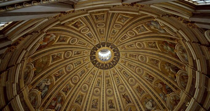 Detail of dome Renaissance ceiling as seen within St. Peter's Basilica in Rome Italy