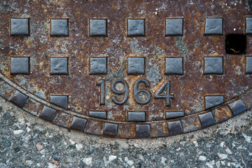rusty manhole cover detail