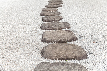 Fototapeta na wymiar Stone walkways in the Japanese garden