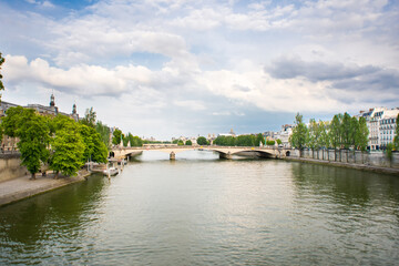 Fototapeta na wymiar Bridge Pont du Carrousel Leading Over the Seine in Paris, Photographed from Bridge Pont Royal.