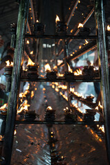 Oil lamps in Buddhist temple, Sri Lanka