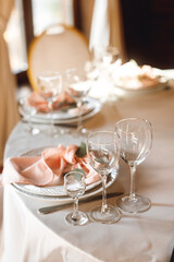 Festive table setting with empty wine glasses