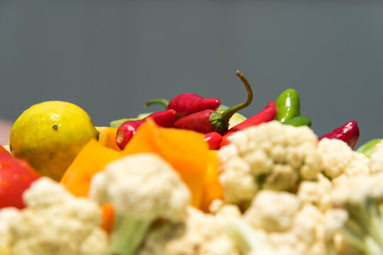 A close up of arrangement and assortment of freshly cut fruits and vegetables.........