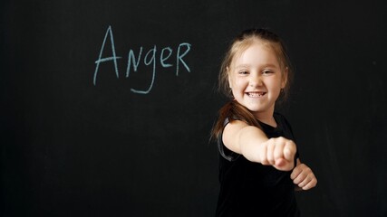 Young beautiful girl of preschool age shows the emotion 