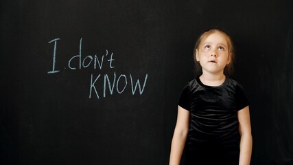 Young beautiful girl of preschool age shows the emotion 