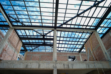 Perspective interior house under construction with clear blue sky background