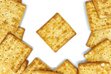 Cream cracker biscuit isolated on white background with copy space.