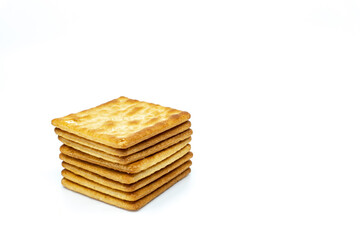 Cream cracker biscuit isolated on white background with copy space.