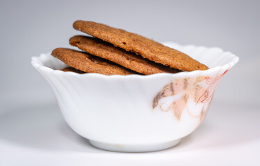 Butter Crunch Cookies served in a small porcelain bowl