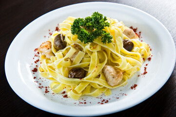 Spaghetti with mushrooms and sauce