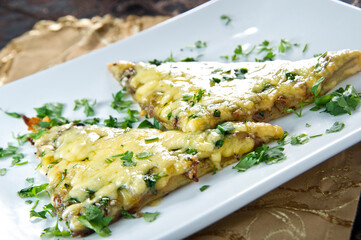 Grilled ham and cheese sandwiches.