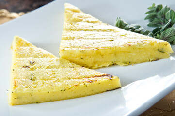 Grilled ham and cheese sandwiches.