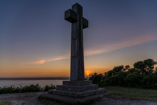 Sunset behind the cross at Dodman Point, Cornwall in late Spring