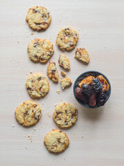 Fresh juicy date cookies it is laid out on a light wooden surface