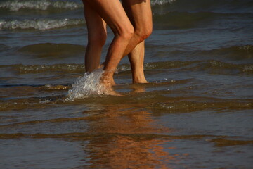 Finally summer, many people walking on the beach 