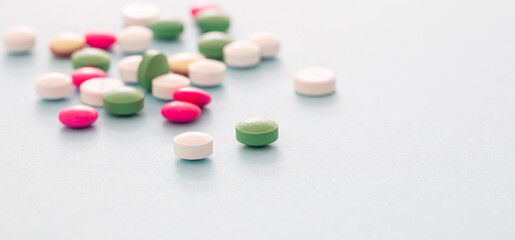 Medicine pills on pastel blue background. Health pharmacy concept