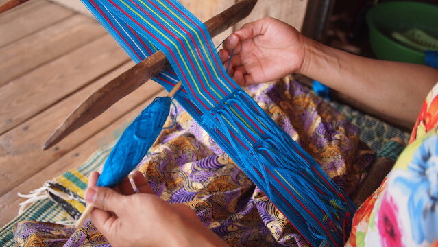 traditional clothes stitching and sewing Myanmmar ethnic cultural handcraft