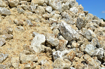 Natural gray gypsum stone. Close up image of stones with black and white. Industrial mining area. Limestone mining, quarry - Imagen