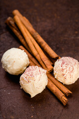 White chocolate covered pralines with cinnamon
