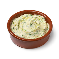 Bowl with herb butter close up