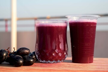 Close up view of pure grape juice. Refreshing Grape juice ready to serve.  Summer drinks 