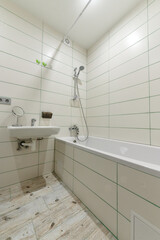 bathroom, toilet, sink, bathtub, white, light with white tiles