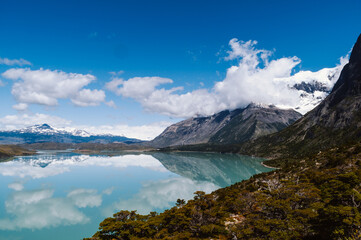 Fototapeta na wymiar Mirroring the sky in a lake in Chile