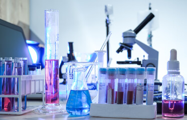 lab supplies glass test tubes, blood test tubes and microscope