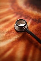 stethoscope on a wooden background