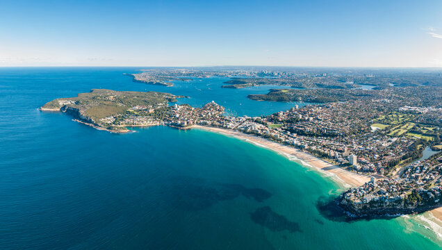 High resolution panoramic high angle drone view of Manly Beach, North Head and the Sydney Harbour area. Manly is a popular suburb of Sydney, New South Wales, Australia. Famous tourist destination.
