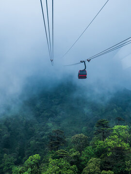 Cable Car is Going Through the Mist of the Clouds from Sa Pa City to Fansipan Mountain in Northern Vietnam