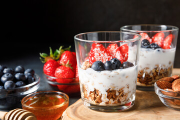 Granola parfait with oat cereal, fresh berries and greek yogurt	