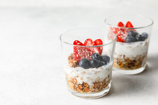Granola parfait with oat cereal, fresh berries and greek yogurt