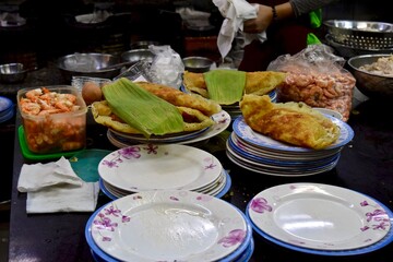 Making Vietnamese pancake at a restaurant.