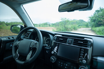 Off road car in the rainy nature