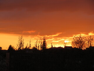 Fototapeta premium Sunset Clouds red sun reflection effect dawn