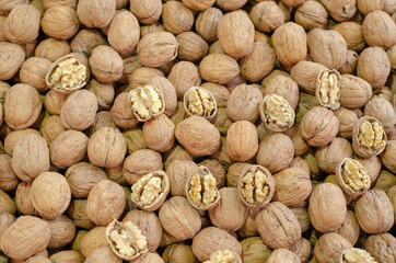 Walnut harvest. Walnuts group  on the wooden table.
