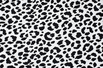 Obraz premium Black spots of different shapes on white background - imitation of dolmatine dog skin