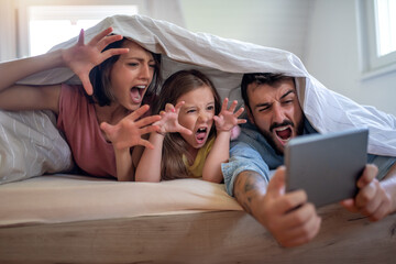 Family in bedroom