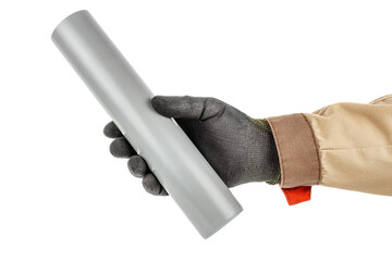 Fragment of a grey plastic sewer pipe in plumber hand in black protective glove and brown uniform isolated on white background