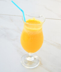 Fresh orange juice on the white 
