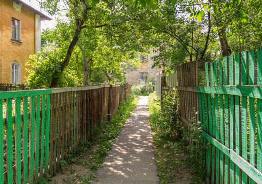 Passage between two fences in the old quarter in Nizhny Novgorod