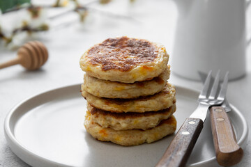 Cheese flapjacks or pancakes. Rounf frities made from cotage cheese.