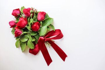 postcard mockup. a small bouquet of red roses and space for text. congratulation. invitation