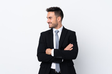 Young business man over isolated background laughing
