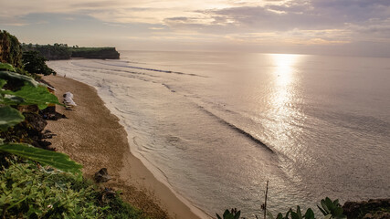 View of the coast of the island of Bali and the ocean. Sea view during sunset. Natural background
