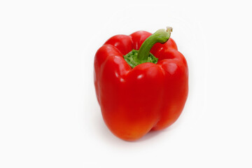 Red bell pepper on a white background. Isolate Fresh vegetables, vitamins, healthy nutrition