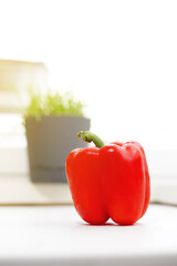 Red bell pepper on a white background. Isolate Fresh vegetables, vitamins, healthy nutrition