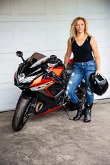 Foto op Plexiglas Young woman and sport motocycle © Yann Poirier